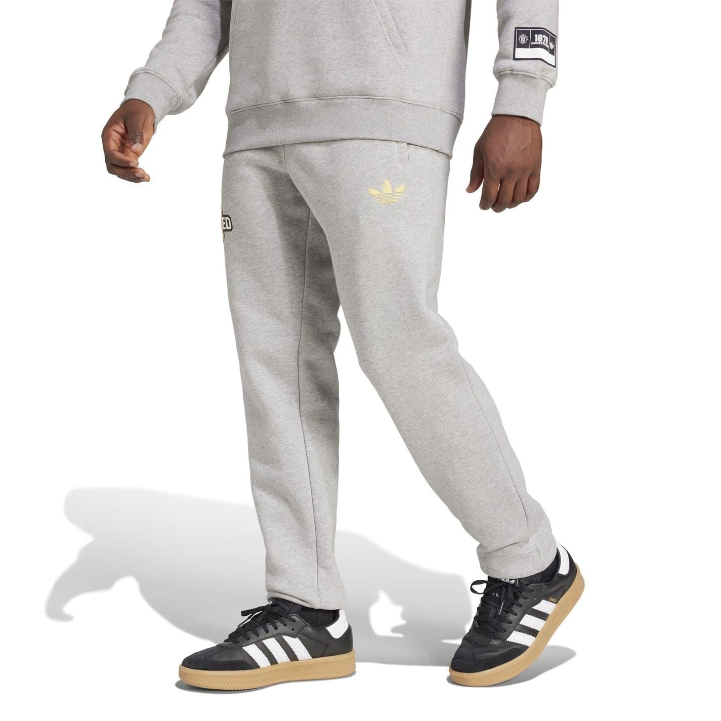 adidas Mu Solid Patterned Slim Track Pants
